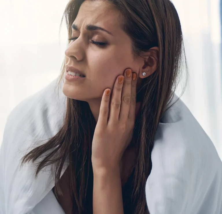 Patient showing tooth sensitivity