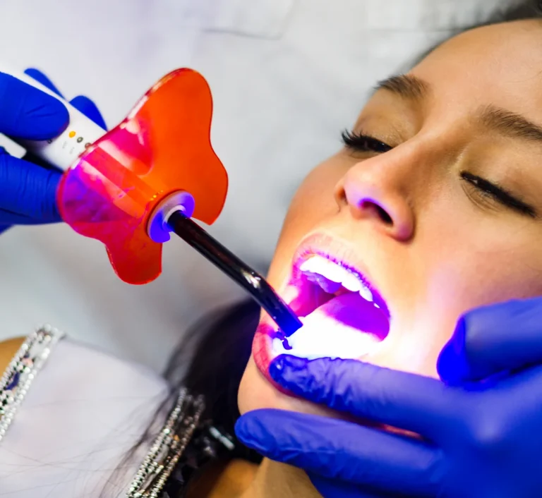 Patient receiving sealant treatment