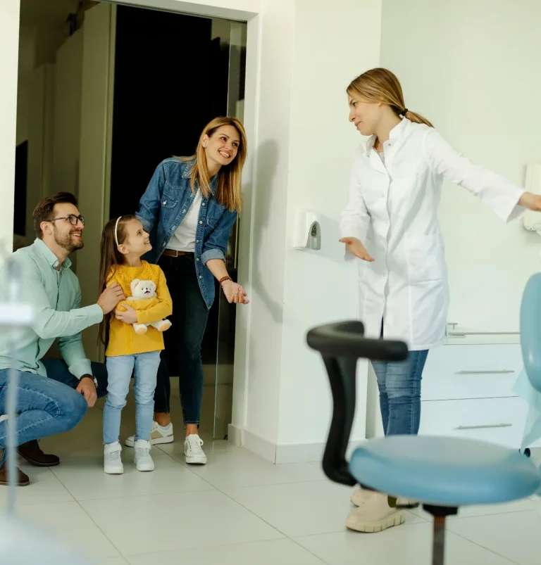Parents and child dentist visit