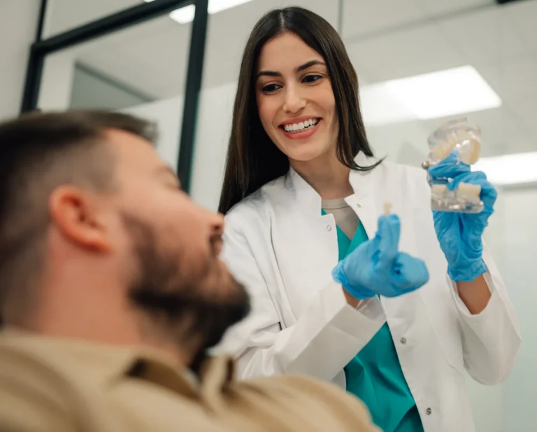 Dentist explaining bone grafting