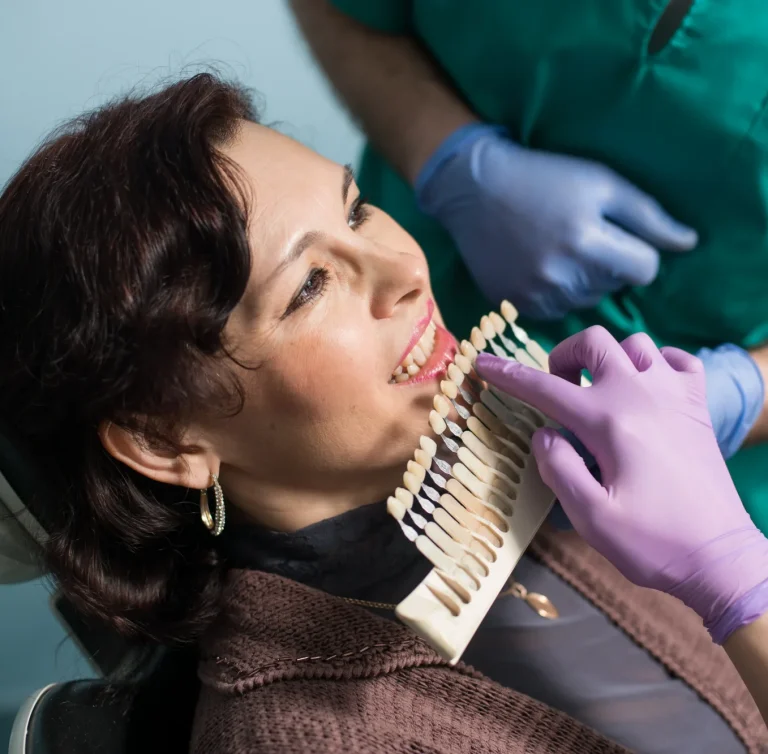 Dentist performing oral screening