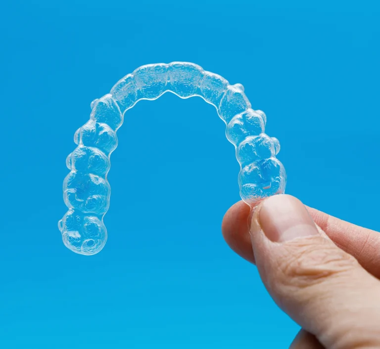 Transparent dental retainer tray