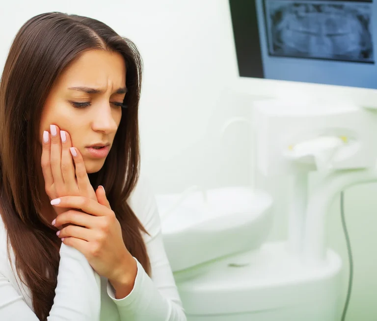 Woman experiencing tooth pain