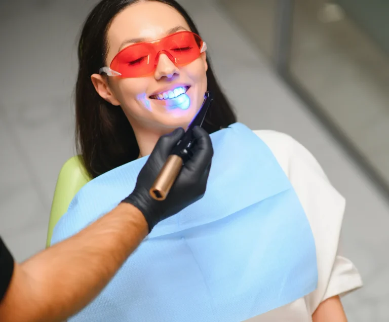 Dentist performing tooth bonding